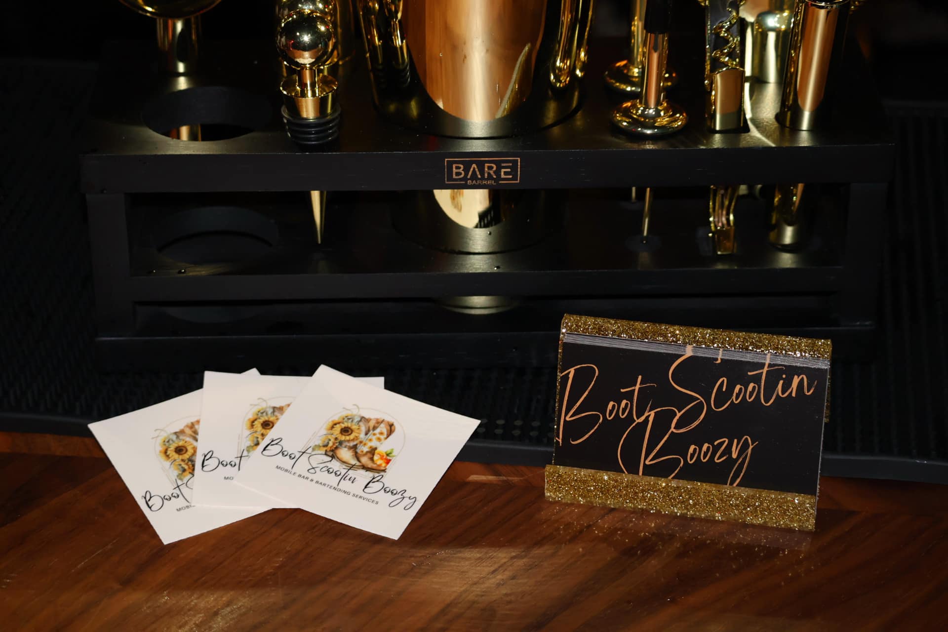 Boot Scootin' Boozy branding with business cards and signature sign