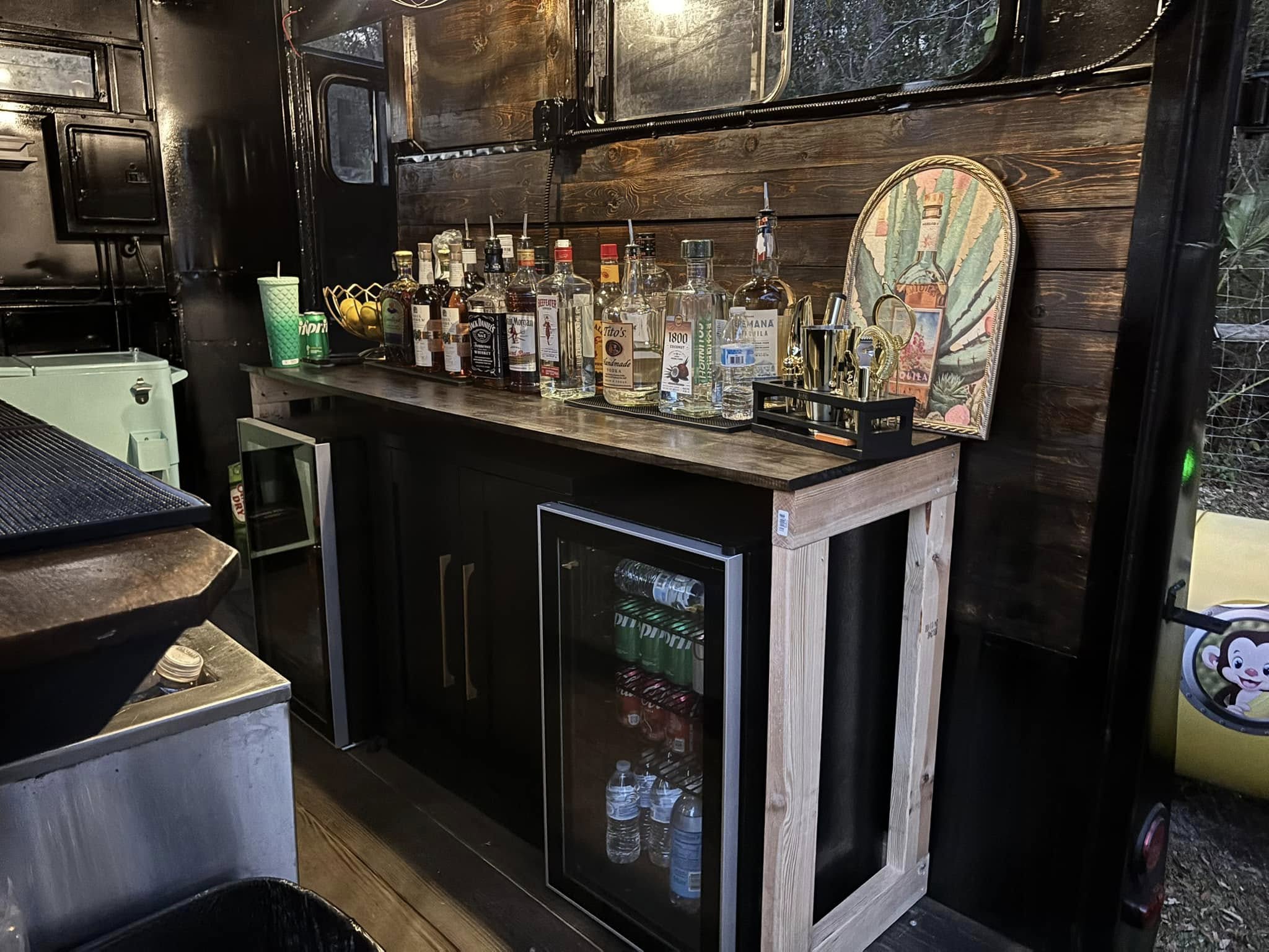 Inside the Boot Scootin' Boozy horse trailer bar